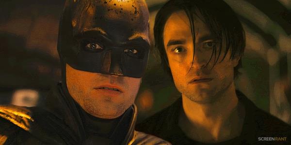 Robert Pattinson's Batman and Bruce Wayne looking shocked in The Batman