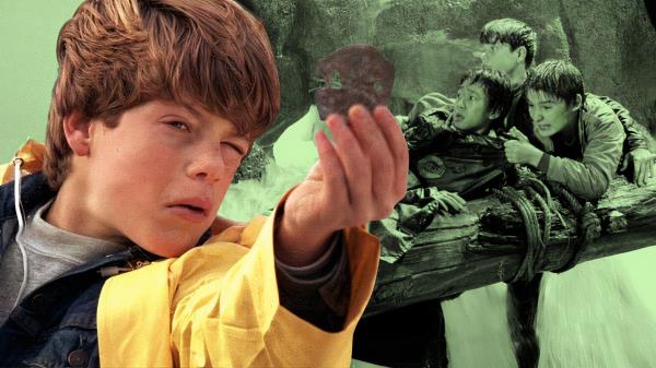 An edited image of Sean Astin, Corey Feldman, and Ke Huy Quan in The Goonies