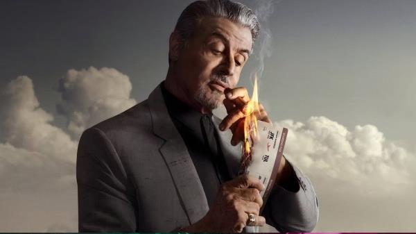 Sylvester Stallone in Tulsa King burning a plane ticket