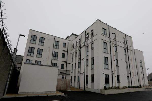 Noel Johnston died after falling out of a flat window during a police raid in October 2021