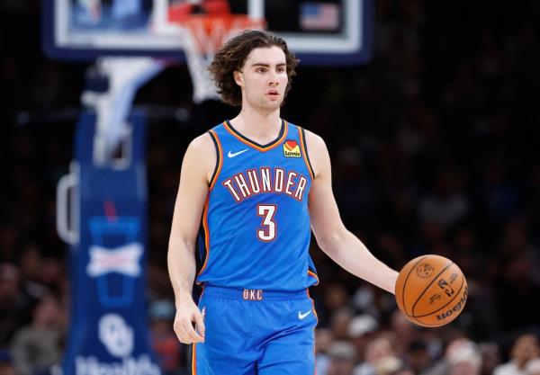 Thunder guard Josh Giddey (3) dribbles the ball down the court against the Los Angeles Lakers