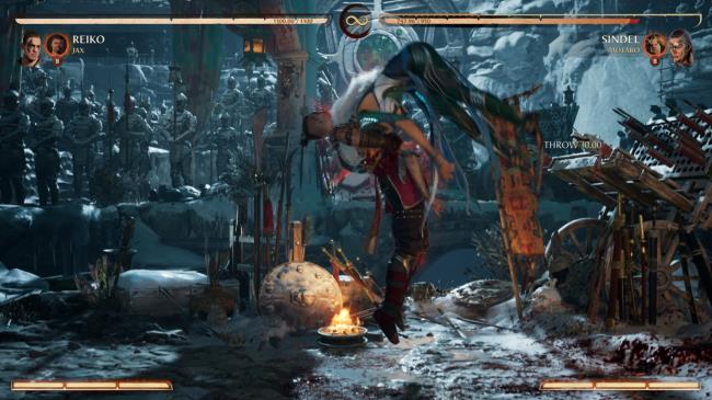 Reiko using his Pale Rider ability to drop Sindel on her head in Mortal Kombat 1.