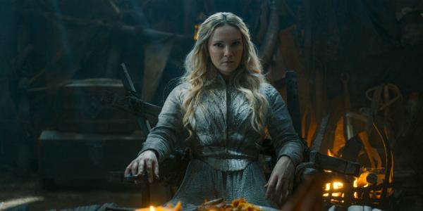 Galadriel (Morfydd Clark) dining with Adar as his priso<em></em>ner in The Lord of the Rings: The Rings of Power Season 2 Episode 6