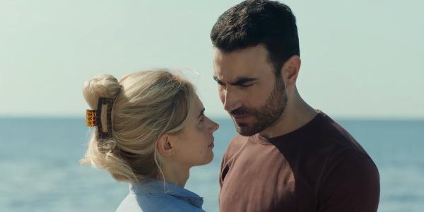 Imogen Poots and Brett Goldstein look lo<em></em>ngingly at each other in All of You still