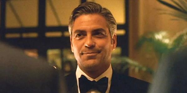 George Cloo<em></em>ney smirking in Ocean's Eleven.