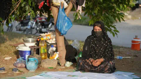 BBC Nazdana looking at her divorce docu<em></em>ments