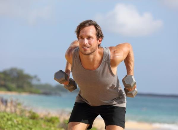 man bent-over row exercise demo<em></em>nstrating how to get rid of balloon belly