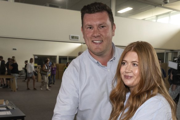 Liberal candidate Nathan Co<em></em>nroy and wife Steffie casting their votes in the Dunkley byelection in Langwarrin on Saturday.