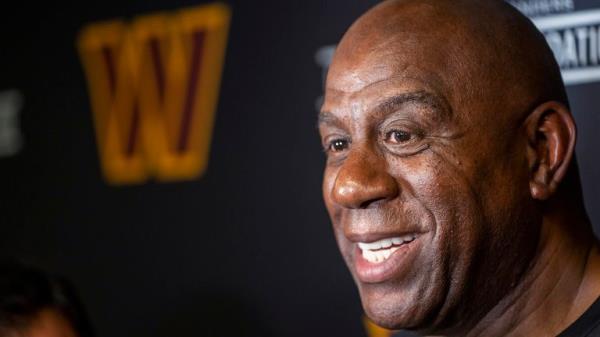 Washington Commanders part-owner Magic Johnson speaks with reporters after an event at the Boys & Girls Club of Greater Washington, Thursday, Sept. 7, 2023, in Washington. (AP Photo/Alex Brandon)