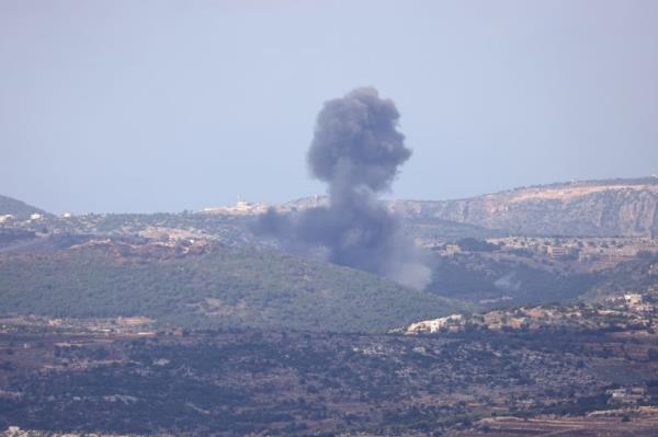 A picture taken from the Israeli side of border with Lebanon shows Israeli shelling near the southern Lebanese village of Aita Al Shaab on November 14